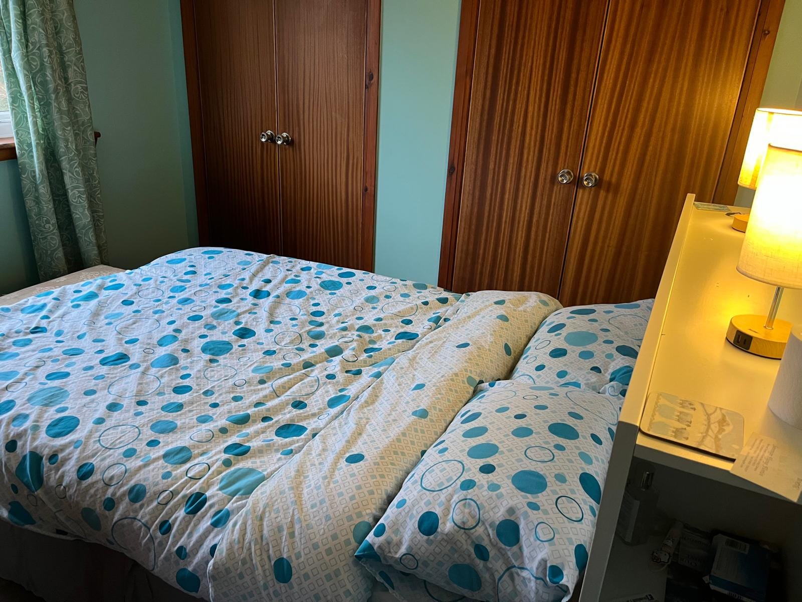 Main double bedroom at Barra Woodview — queen bed with both built-in wardrobes